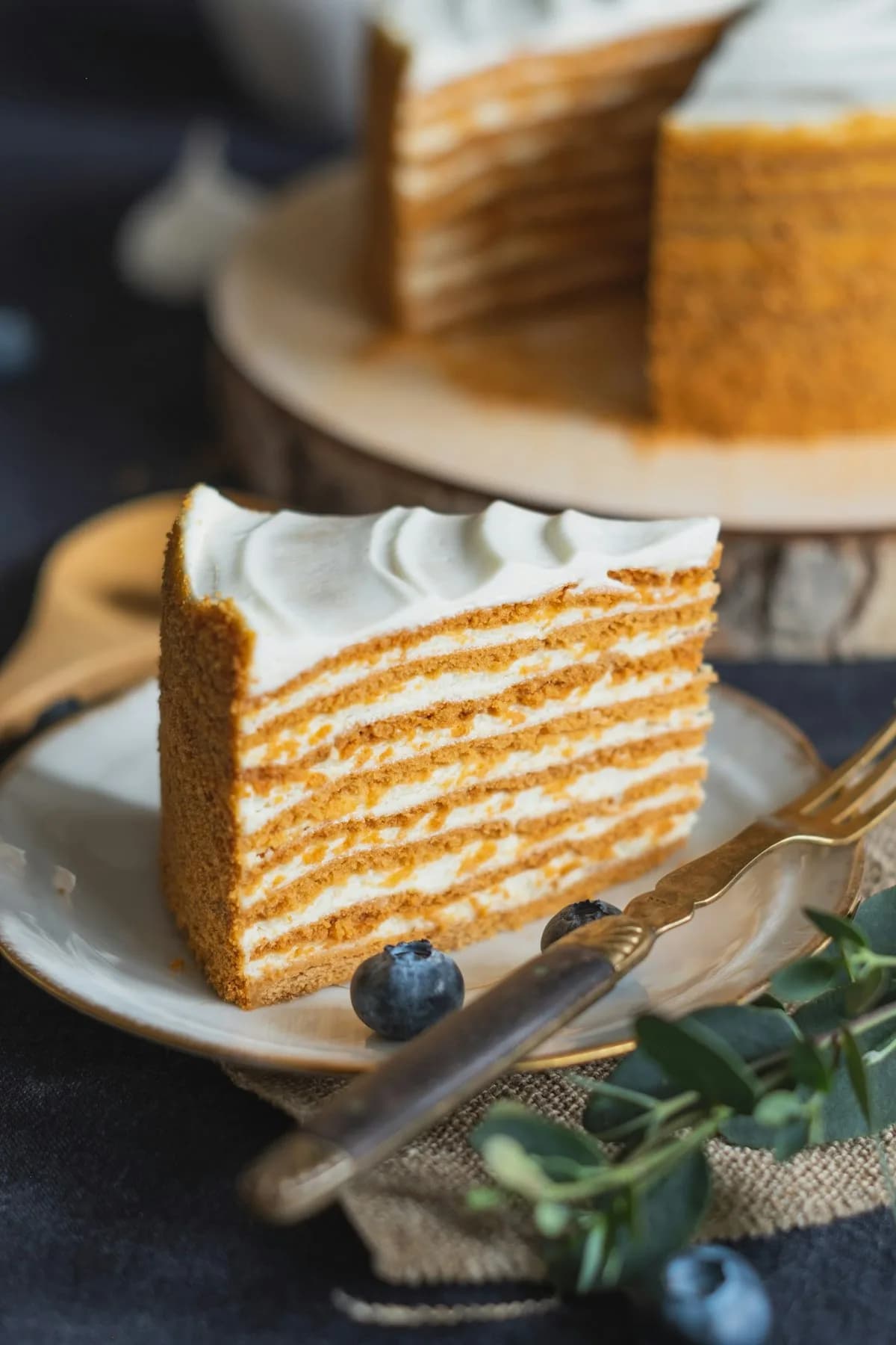 Slice of layered honey sponge cake